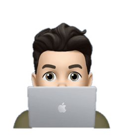 Memoji at a computer